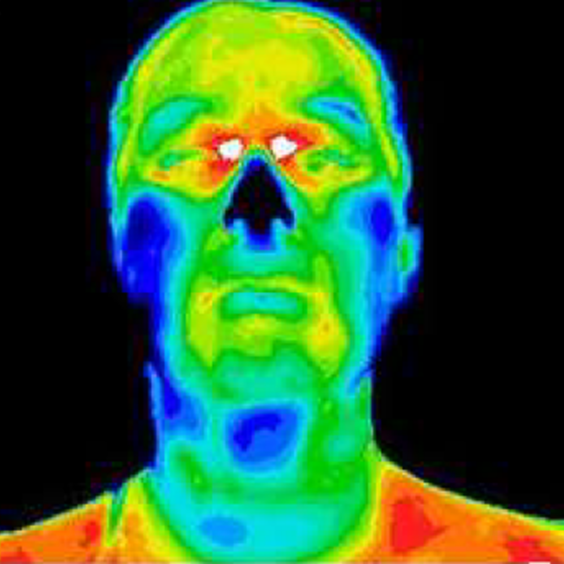 A thermal image of a man 's face and neck.