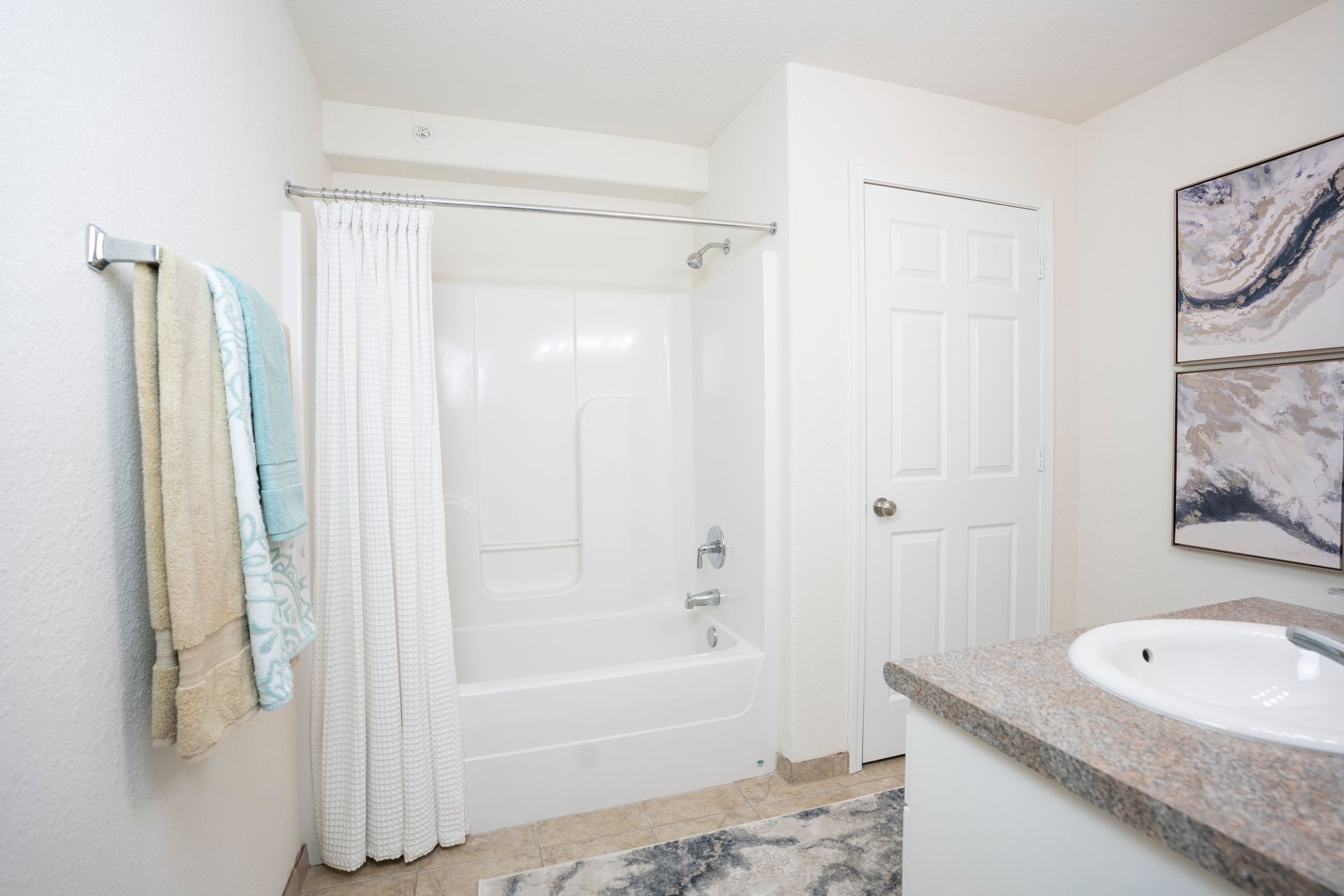master bathroom that is white, clean, and pretty