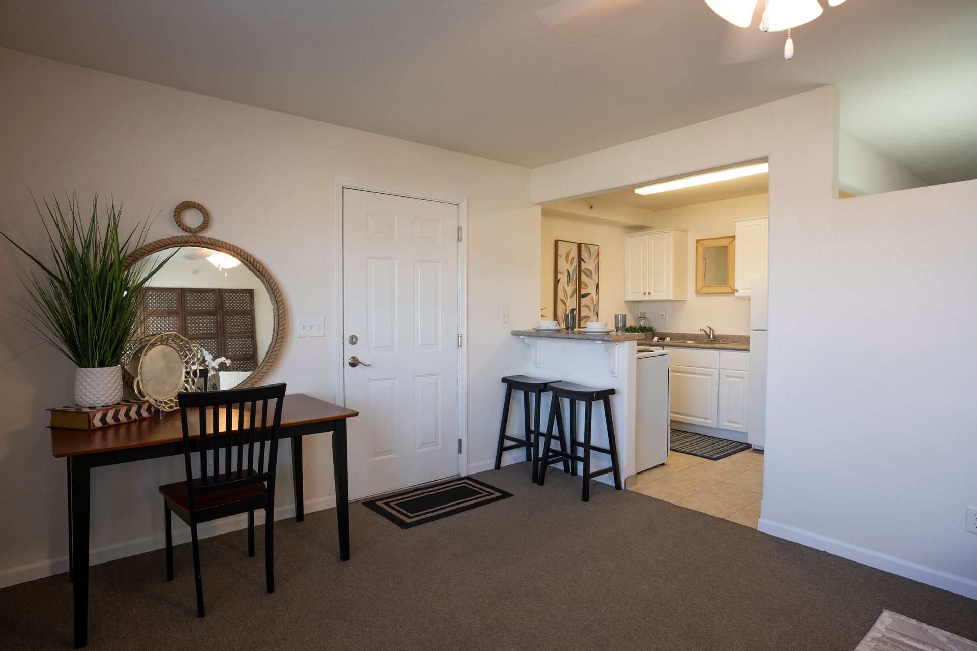 Alternate view of nice white room with pretty furniture