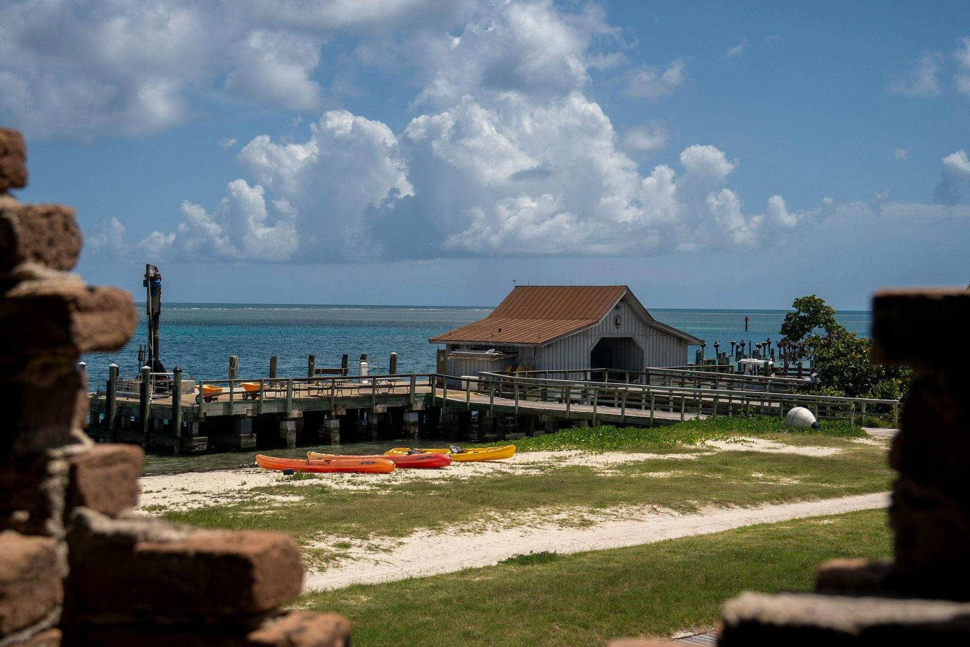 view of a dock by the ocean water