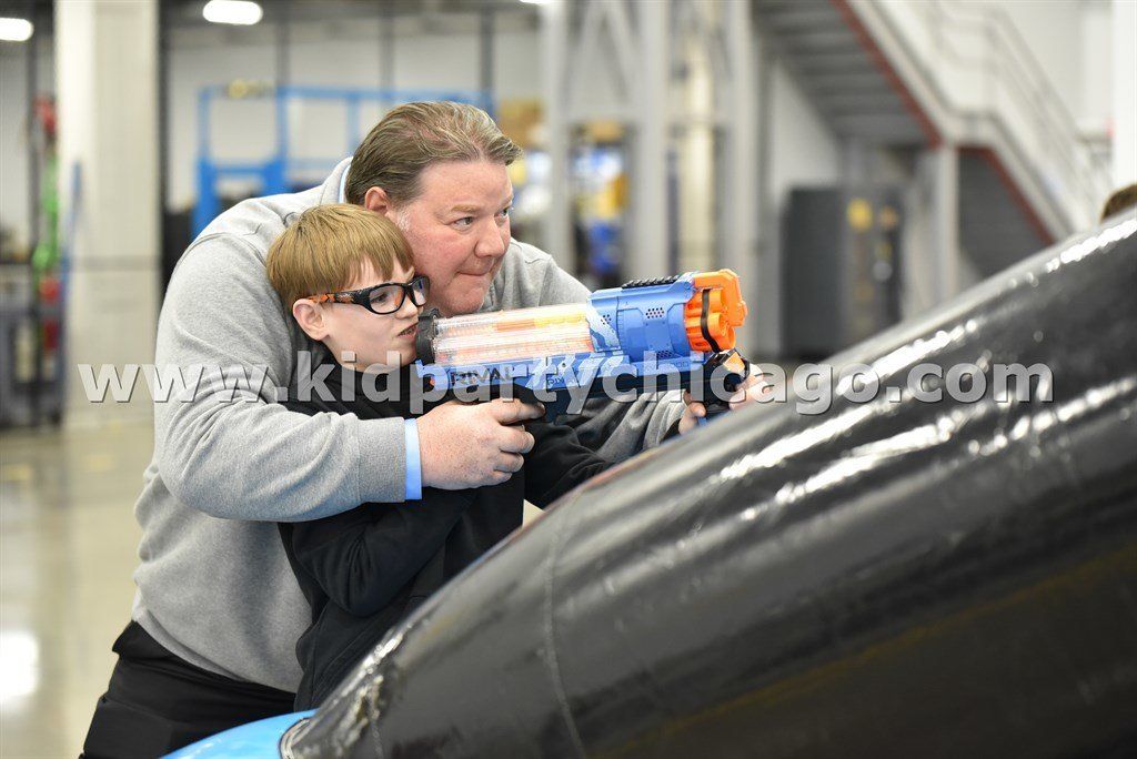 kid party chicago inflatable shooting gallery rental