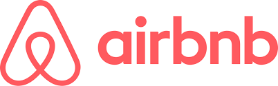 Airbnb logo in red with an abstract symbol and the word "airbnb".