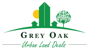 Grey Oak Urban Land Deals logo: Green buildings, sun, tree over 