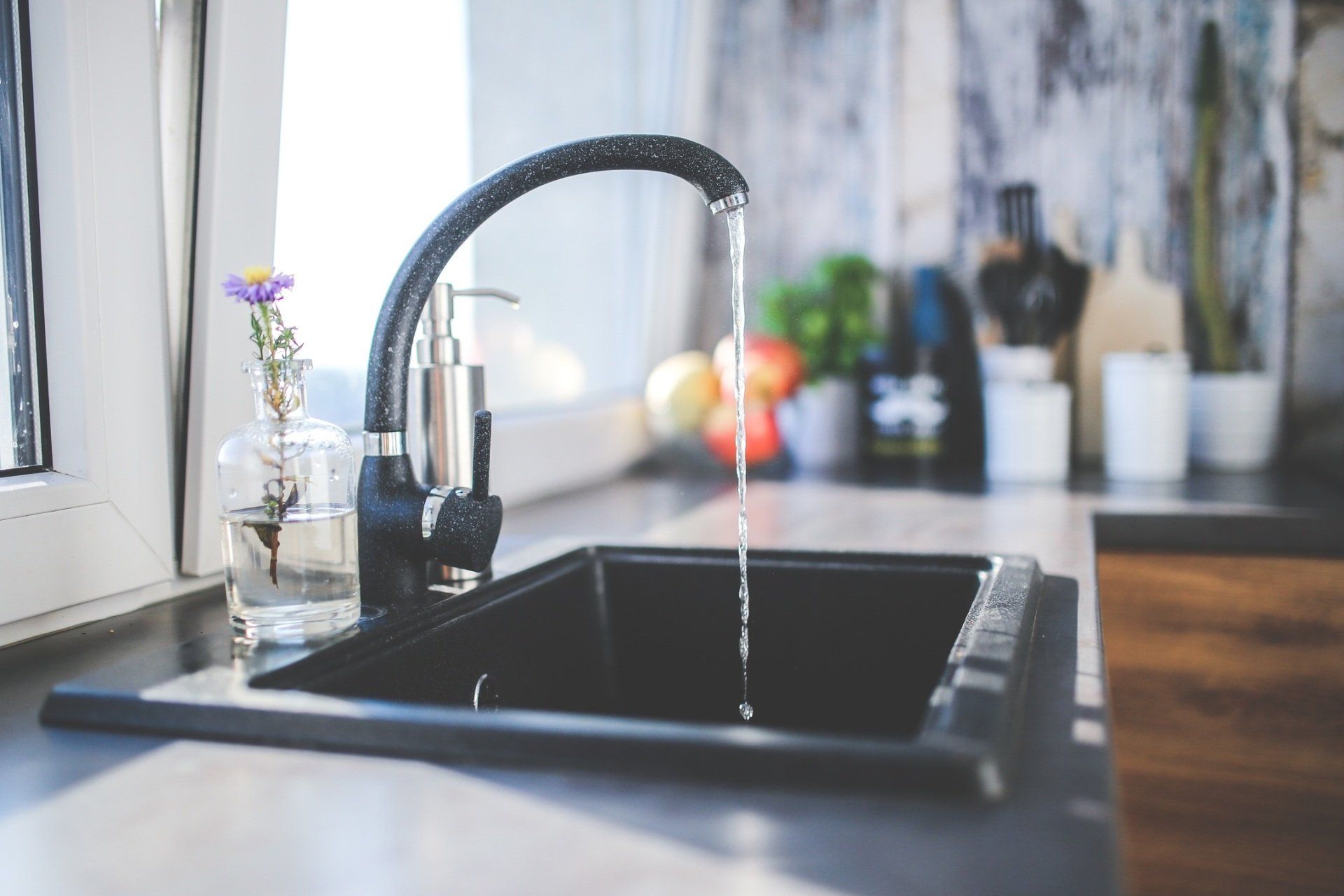 kitchen tap water flowing