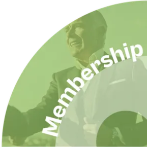 A man in a suit and tie is standing in a green circle with the word membership written on it.