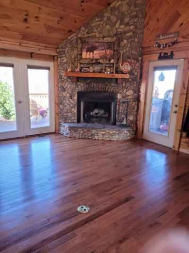 There is a fireplace in the middle of the room.