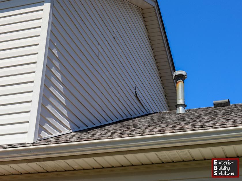 How to Best Deal With Siding Damage After a Storm