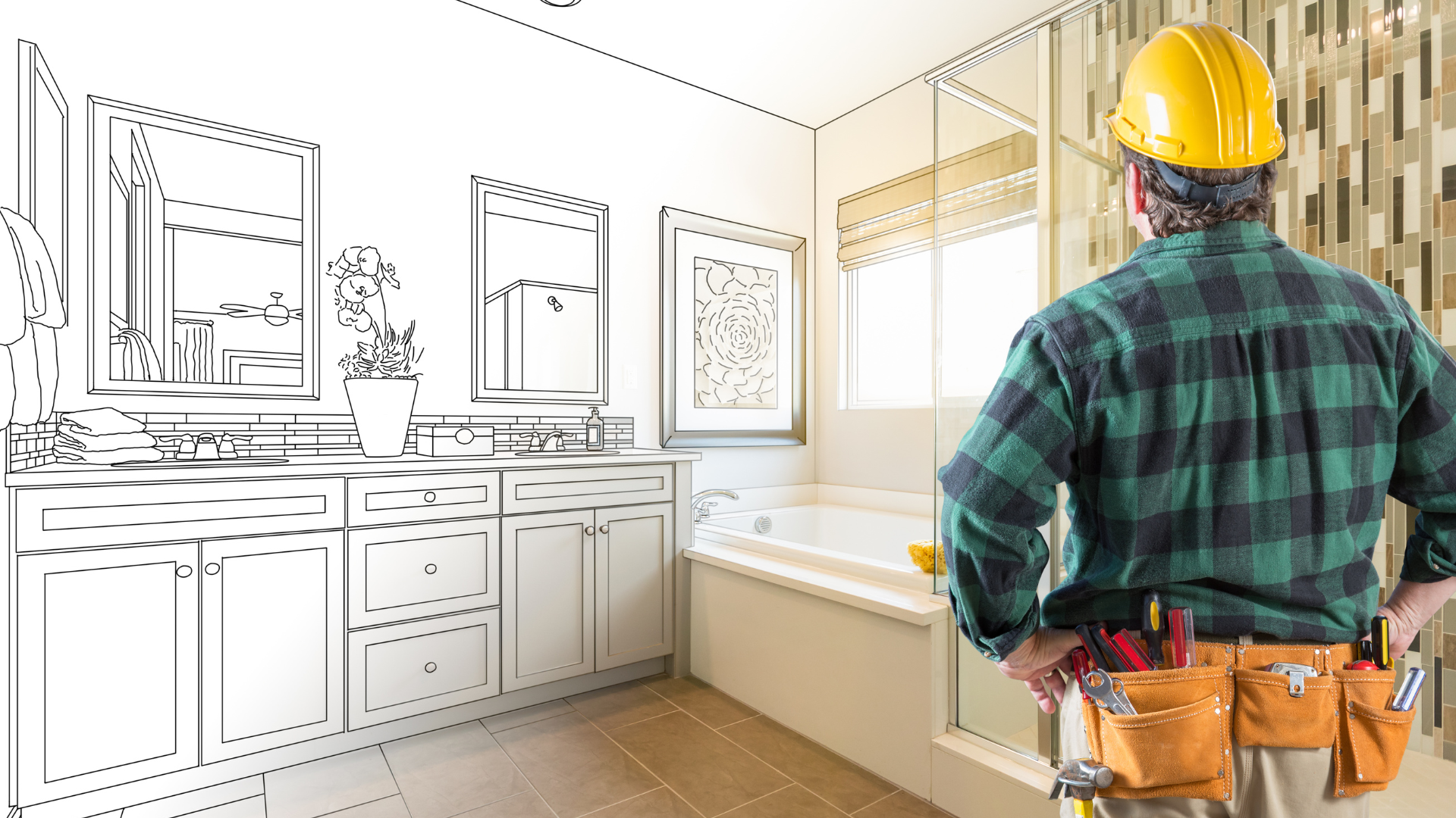 A construction worker is standing in a bathroom next to a drawing of the bathroom.