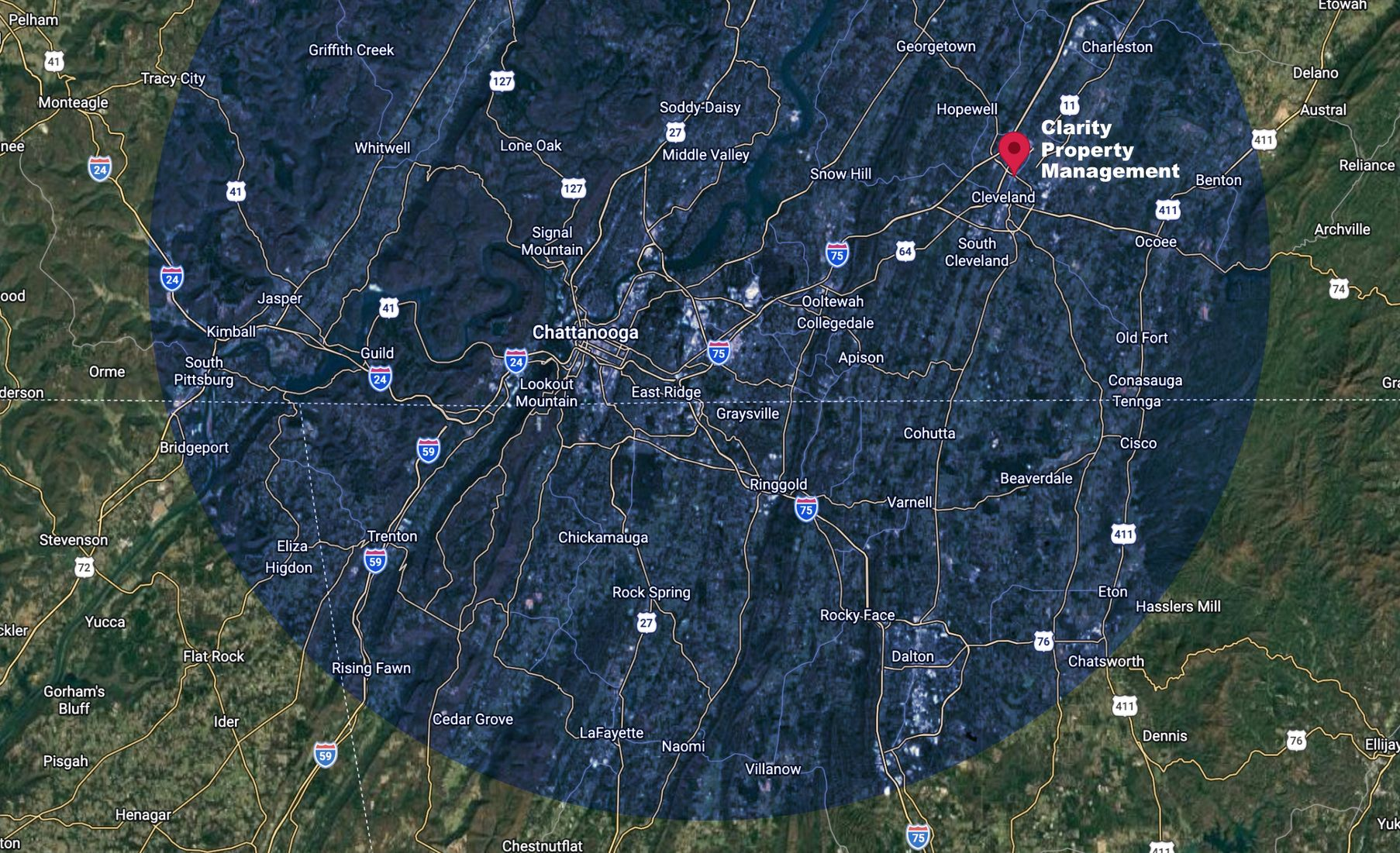 Aerial view of a city center with a blue circle overlay, possibly indicating a geographic area of interest.