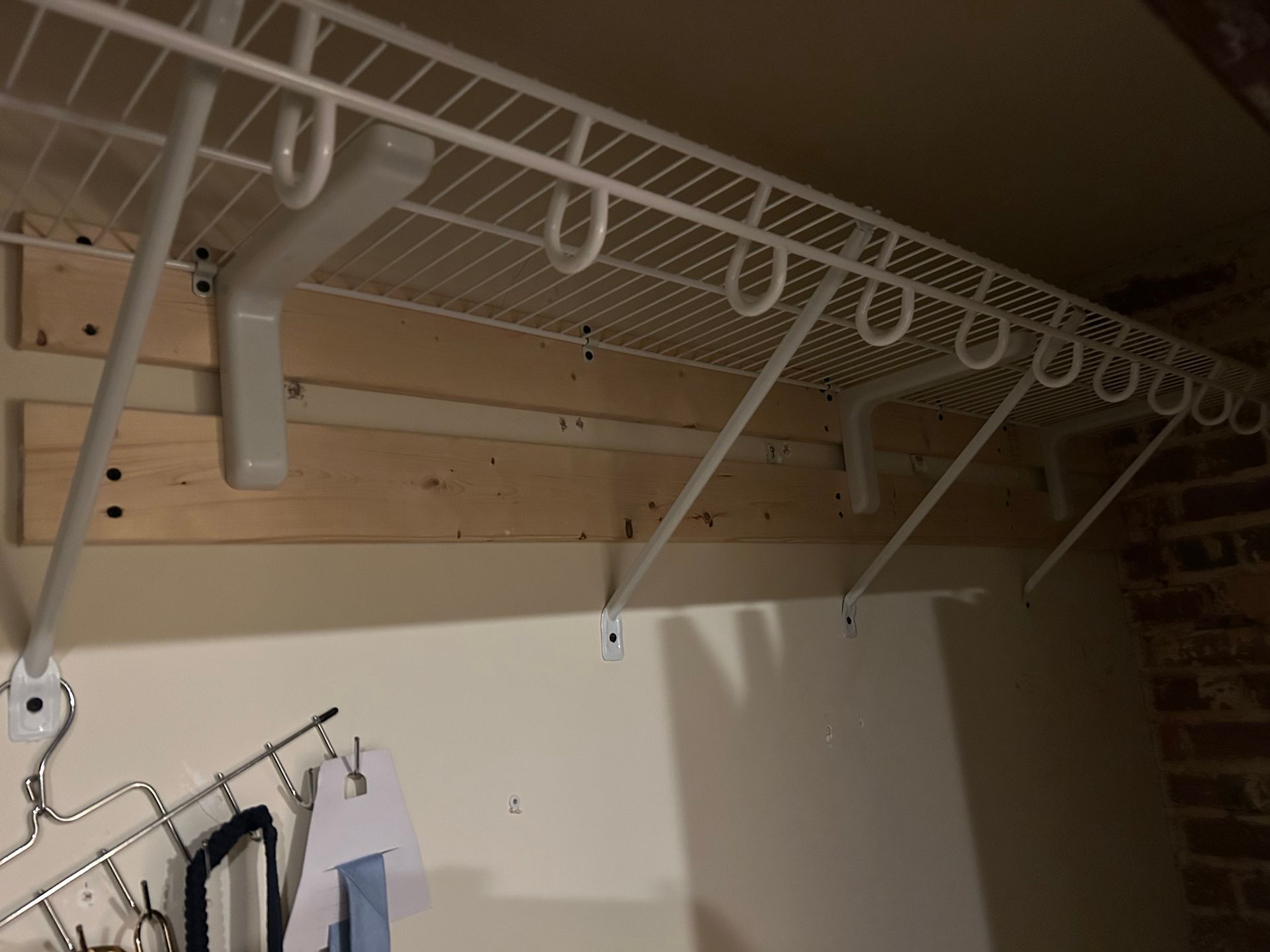 After image of the closet shelf repaired and reinforced