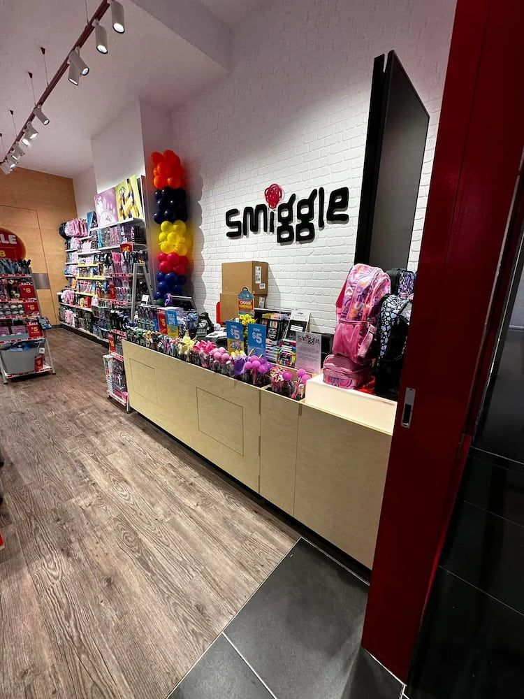 Smiggle Store Interior With Merchandise on Display; a Counter and Logo Are Visible — Prestige Painting NT in Zuccoli, NT