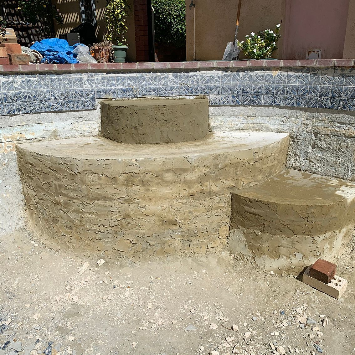 Steps being added on the pool