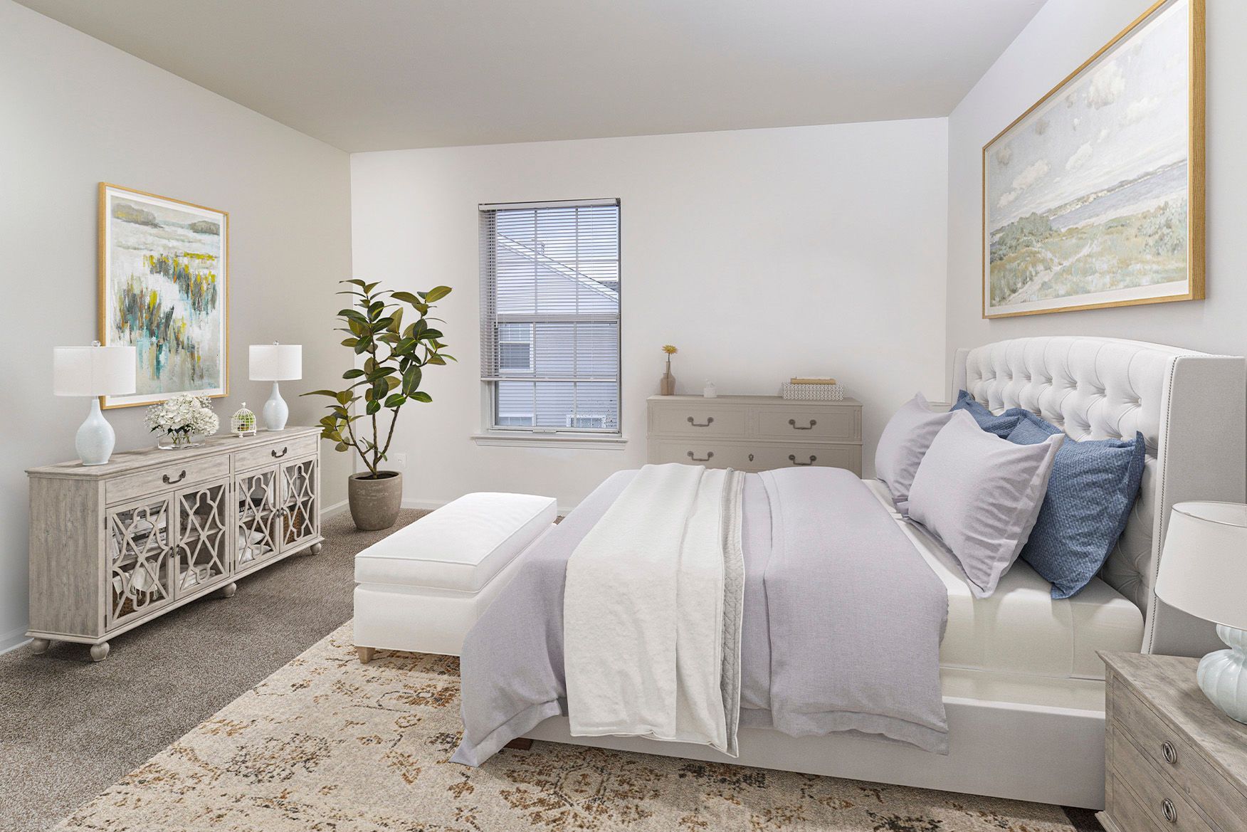 Furnished apartment bedroom with tufted headboard, dresser, plant, and a window.