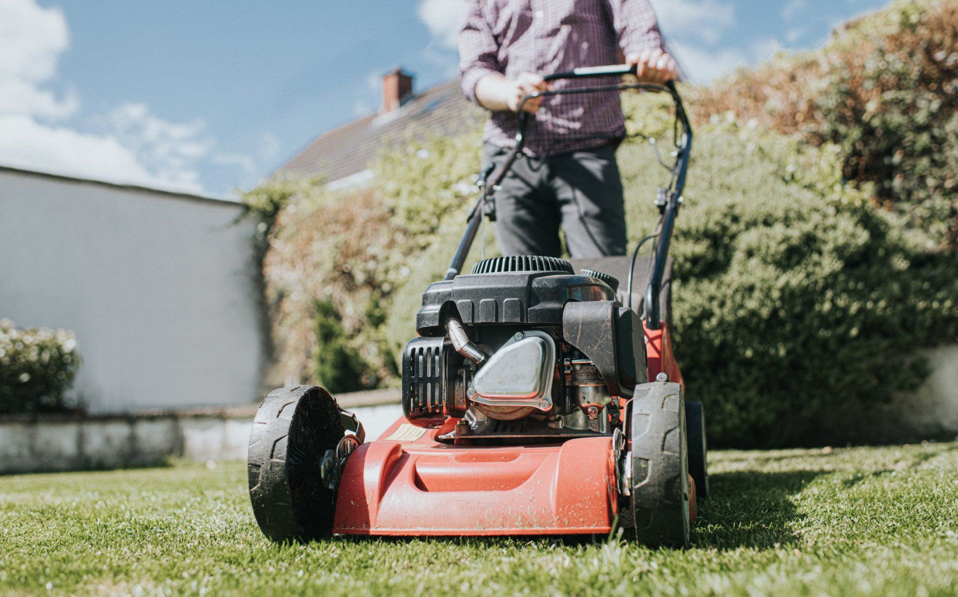 Man Mowing The Grass — West Mansfield, OH — Faber Landscape & Greenery LLC
