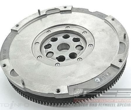 A Close Up of a Clutch and Flywheel on a White Surface — Wodonga Brake & Clutch In Wodonga, VIC