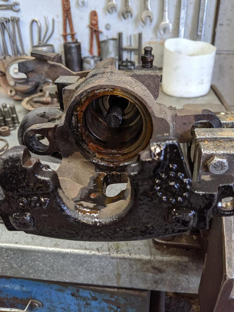 A Piece of Metal is Sitting on Top of a Table in a Vise — Wodonga Brake & Clutch In Wodonga, VIC