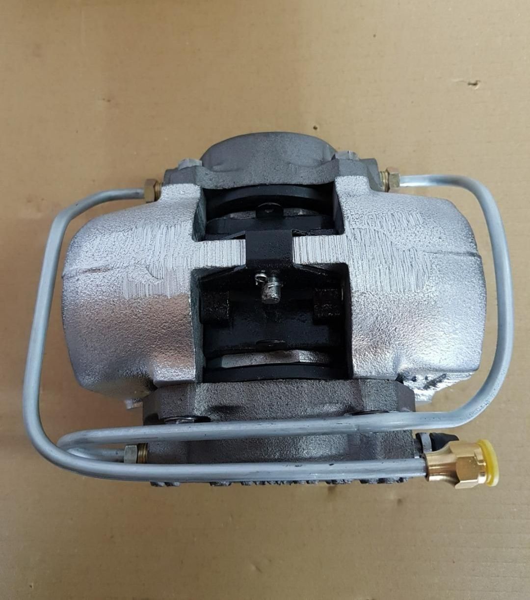 A Close Up of a Brake Caliper on a Table — Wodonga Brake & Clutch In Wodonga, VIC