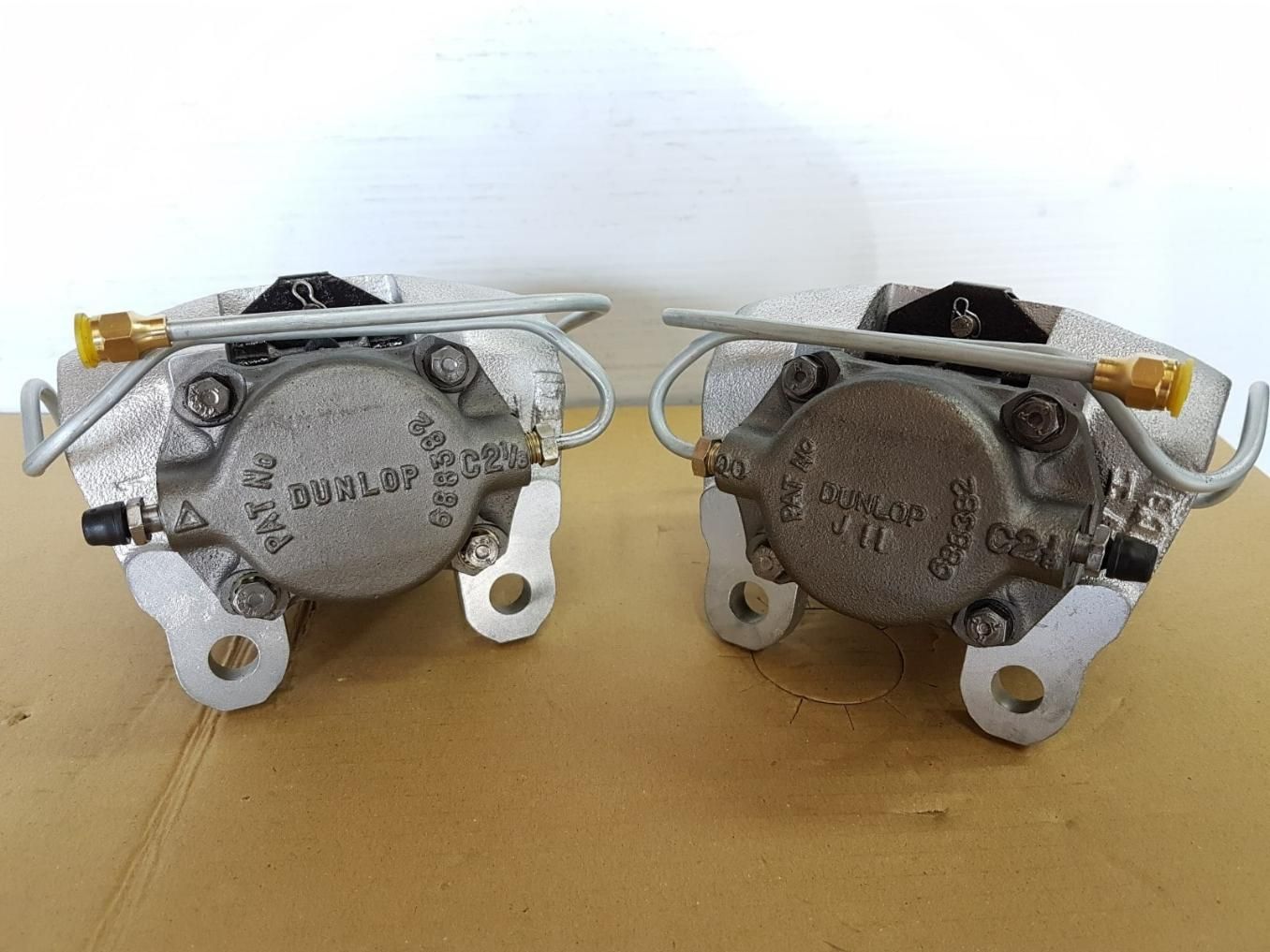 A Pair of Brake Calipers Are Sitting on Top of a Table — Wodonga Brake & Clutch In Wodonga, VIC