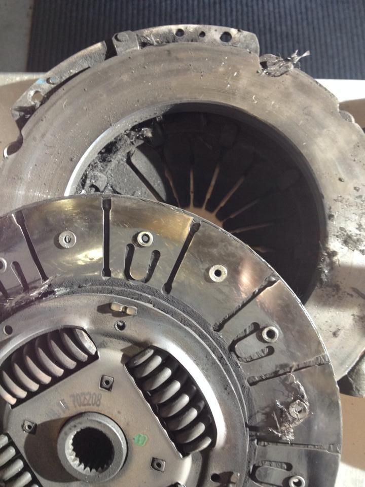 A Close Up of a Broken Clutch Plate With the Letters Lc on It — Wodonga Brake & Clutch In Wodonga, VIC