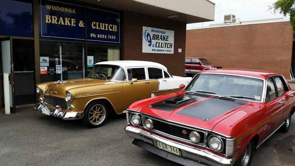 Two Old Cars Are Parked in Front of a Building That Says Brake and Clutch — Wodonga Brake & Clutch In Wodonga, VIC