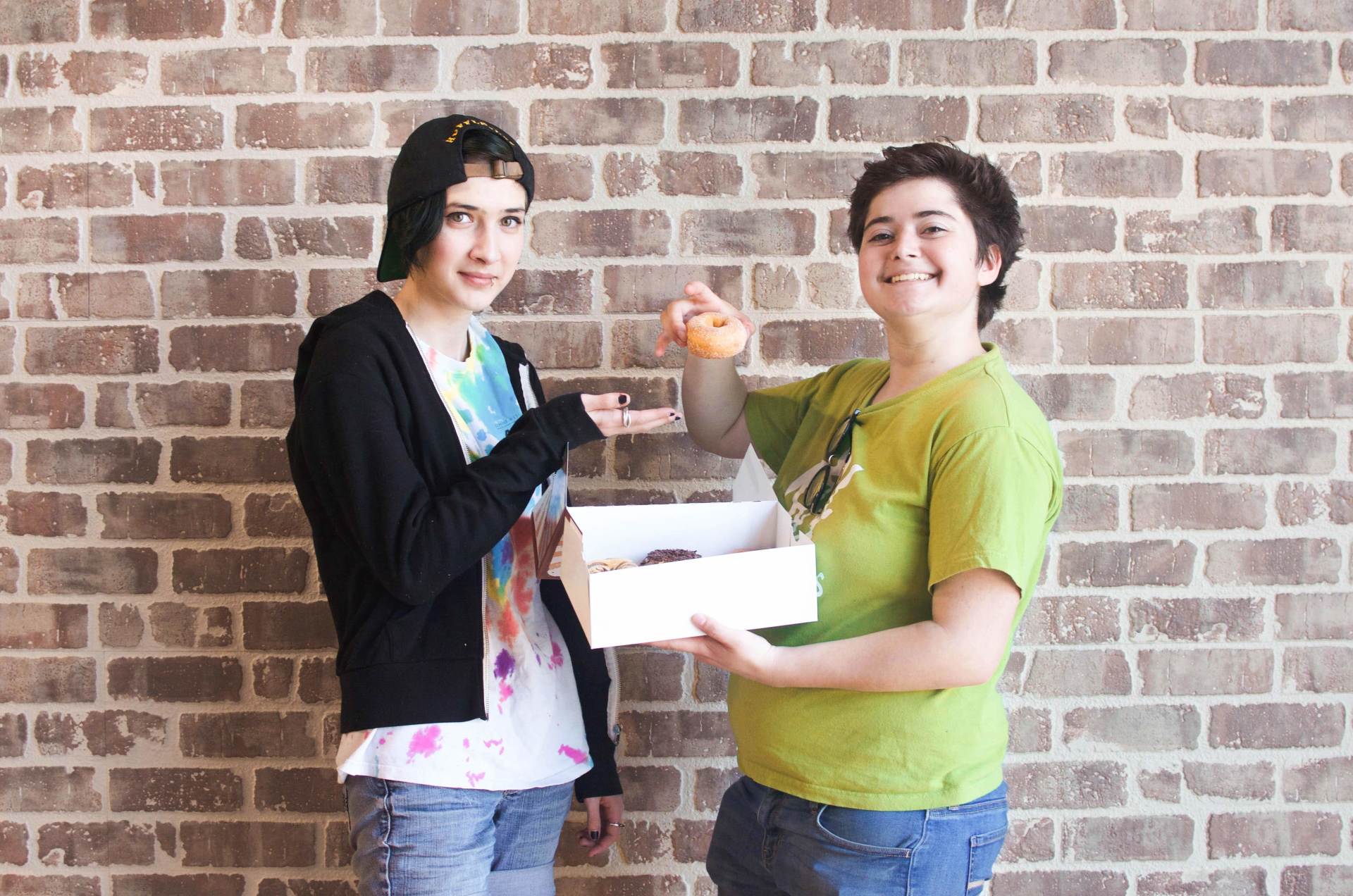 Two Teenagers Sharing A Donut — Delaware, OH — The Dipped Donut