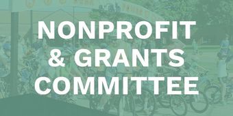 A green background with the words `` nonprofit & grants committee '' on it.