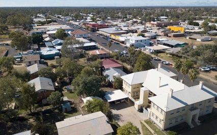 An Aerial View Of A Small Town With Lots Of Houses And Trees — Brisbane Moving & Storage In Charleville, QLD