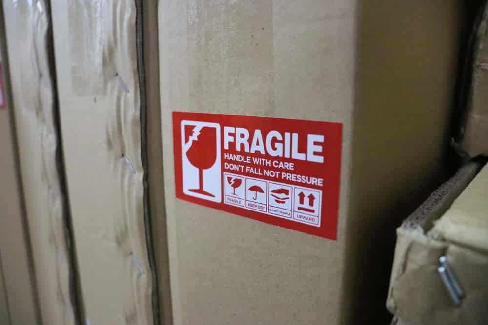 A Cardboard Box With A Fragile Sticker On It — Brisbane Moving & Storage In Acacia Ridge, QLD
