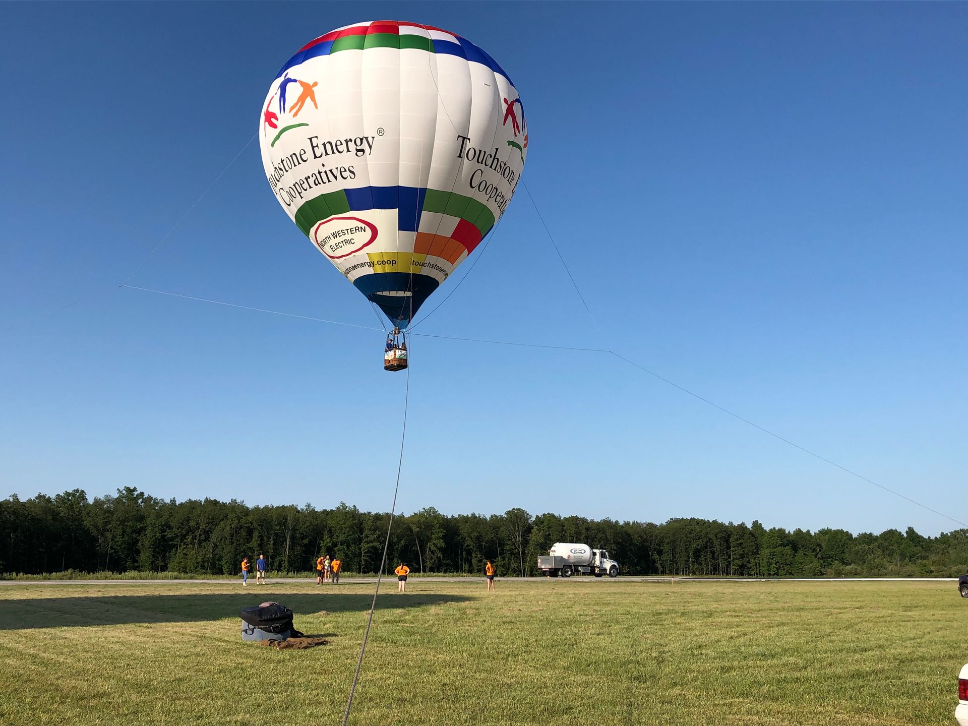 People in a grassy park with the words Vendor Registration, Sign up now!