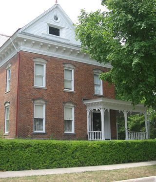 Photo of the second floor of a brick building.
