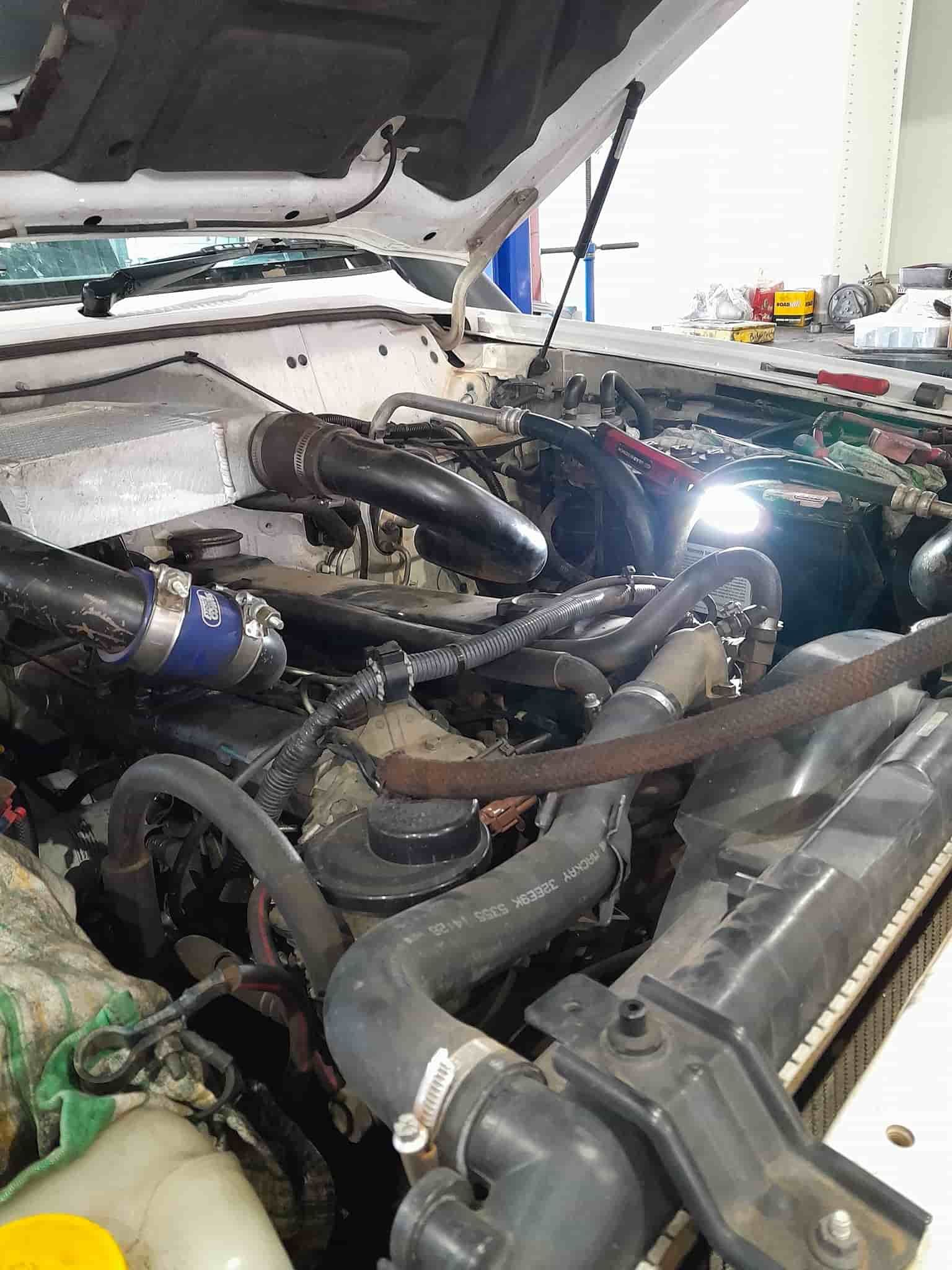 A Close Up of a Car Engine With the Hood Open — CB Automotive In Yatala, QLD