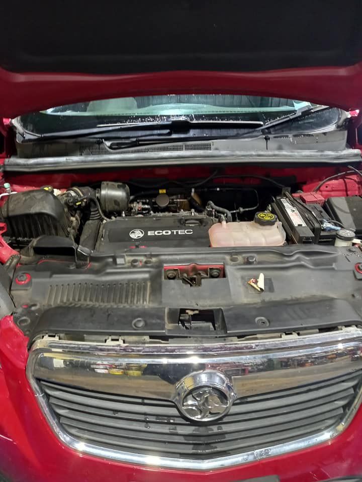 The Hood of a Red Car is Open and the Engine is Visible — CB Automotive In Yatala, QLD