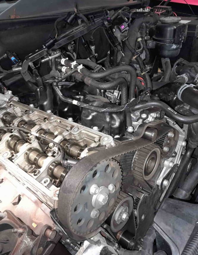 A Close Up of a Car Engine With the Hood Open — CB Automotive In Yatala, QLD