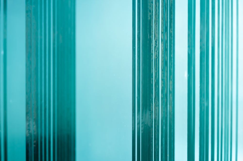 A Person is Driving a Car With a Rear View Camera — Keppel Coast Windscreens in Emu Park, QLD