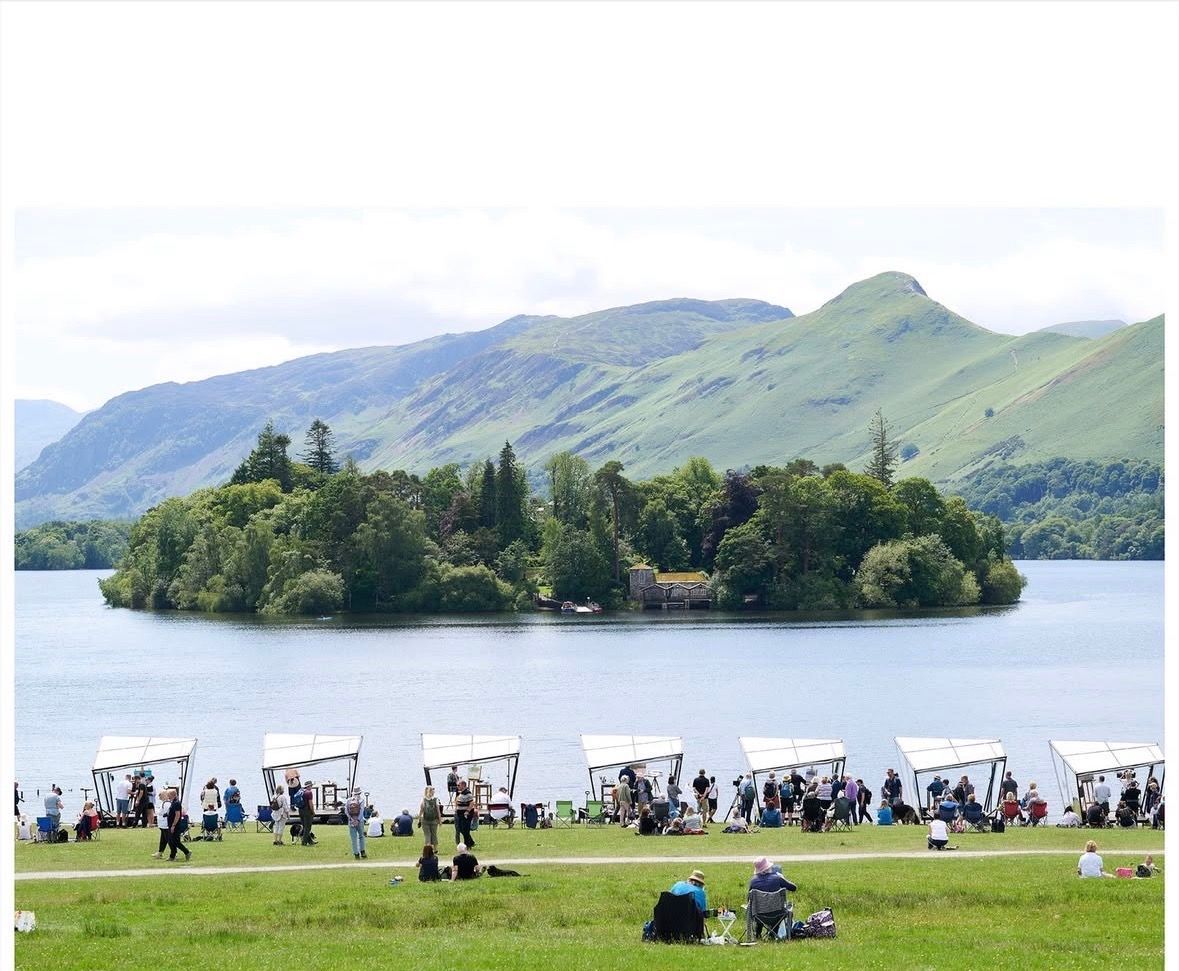 A view of Derwent water with the sky arts pods in the view

