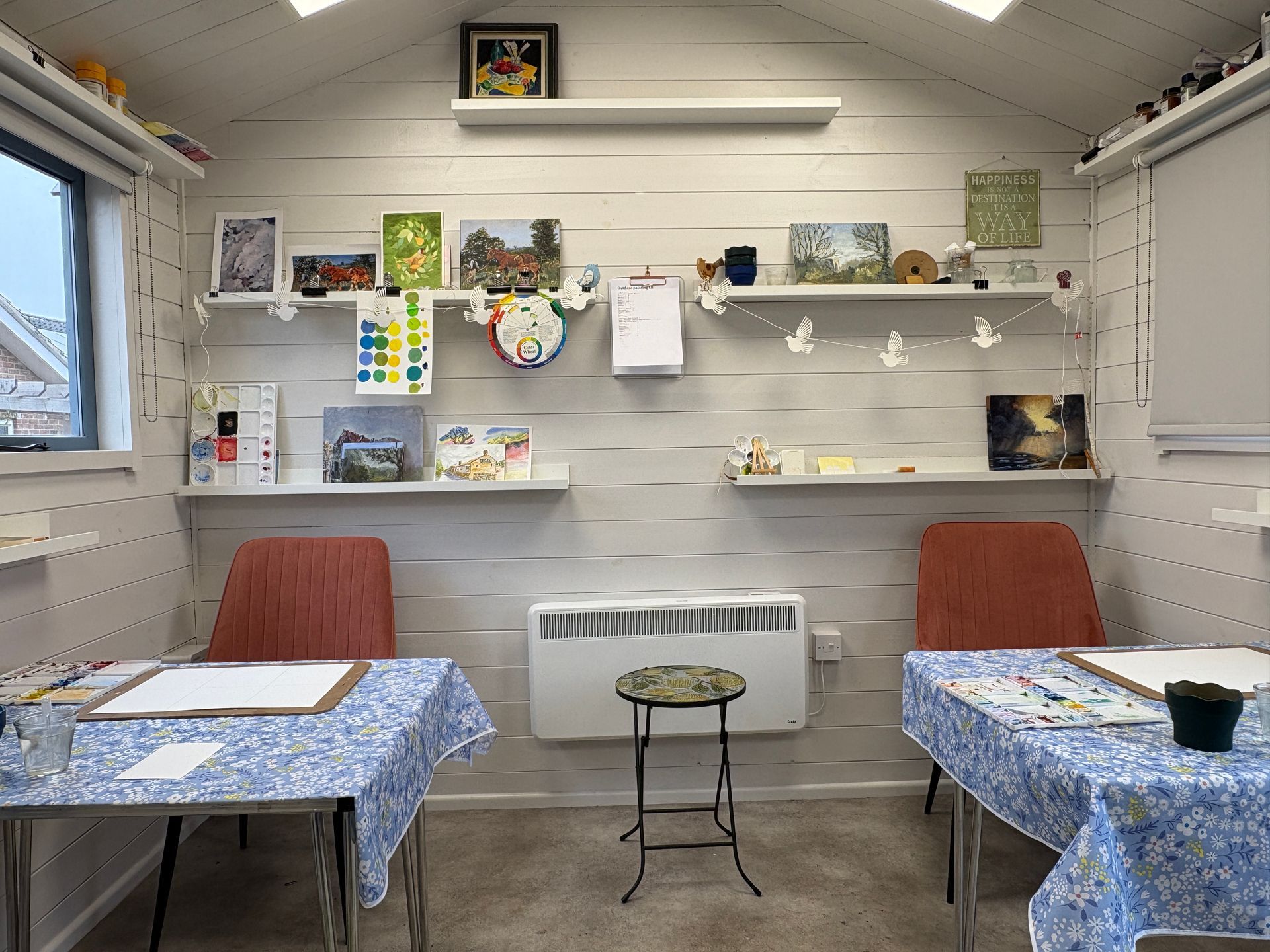 A tidy studio space ready for two learners.