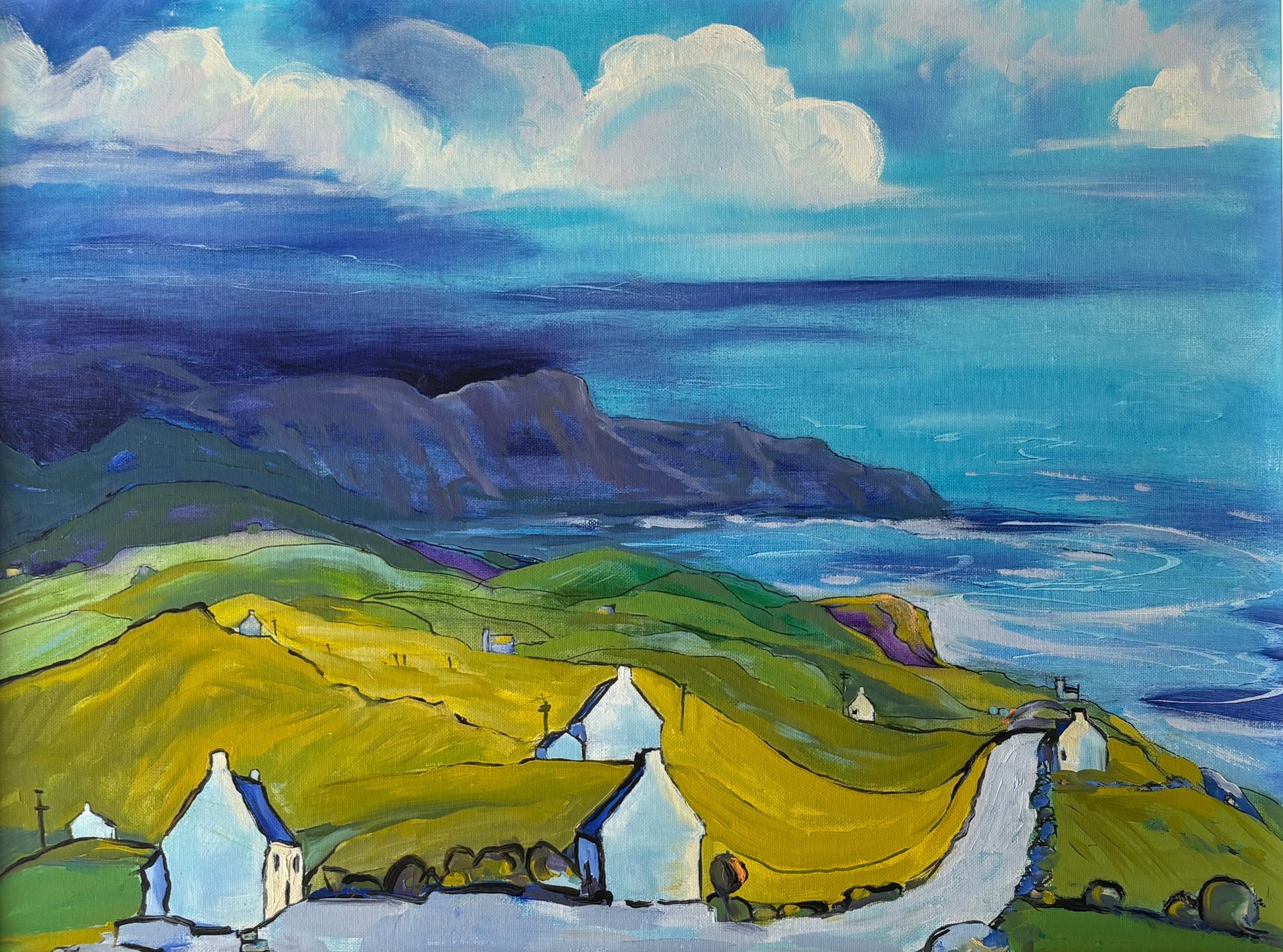An oil painting of cottages overlooking  the sea.