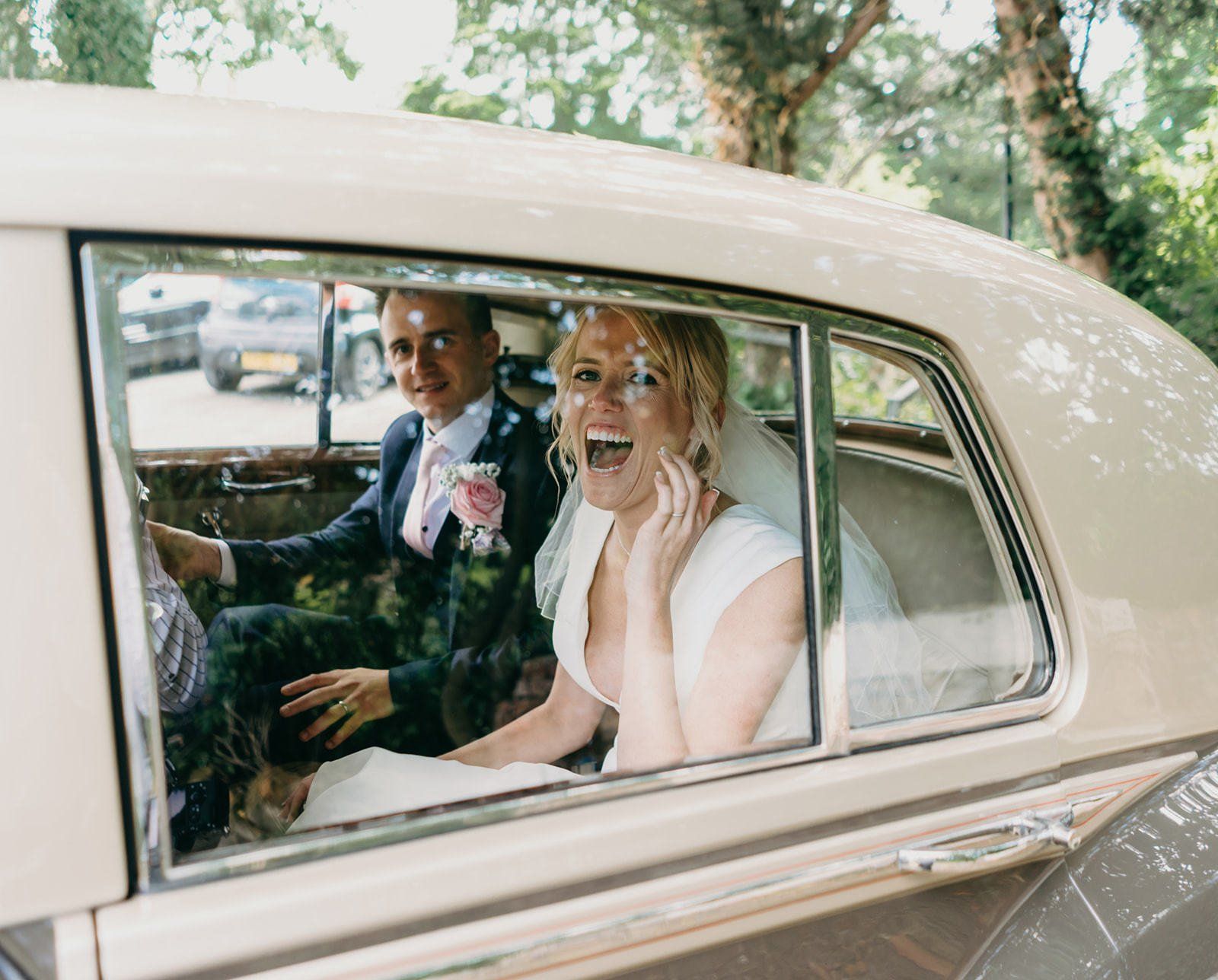 wedding car reigate natural moment bride