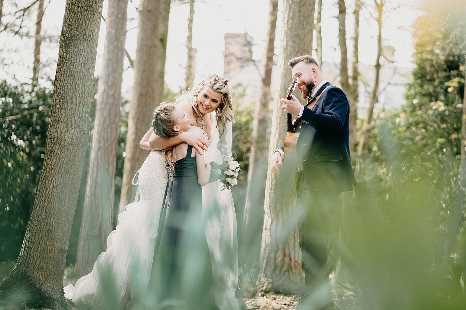 groom playing guitar to bride wedding in Yarm