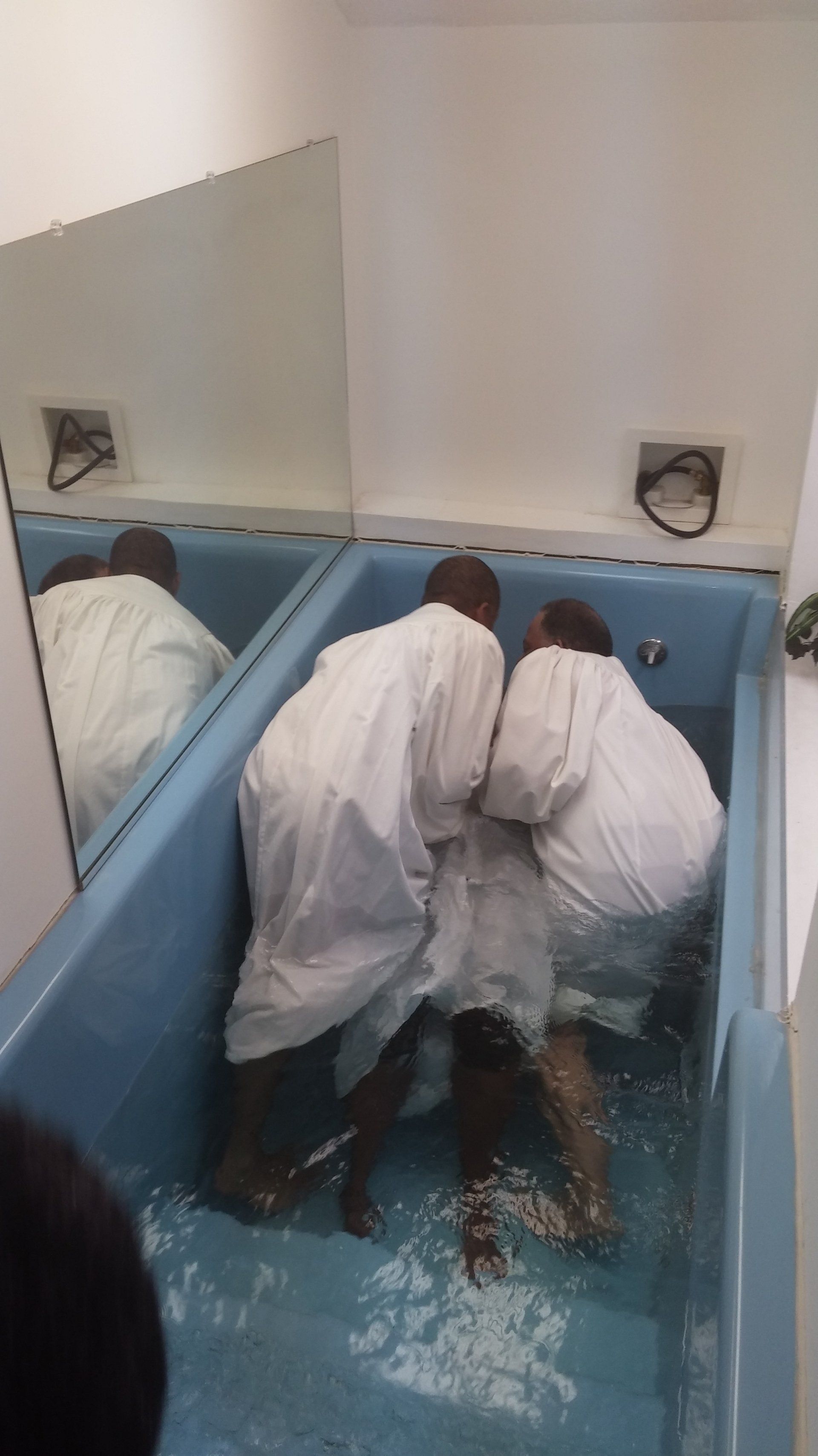 Two People Giving Baptism To A Member | Waverly, GA | Calvary Christian Center