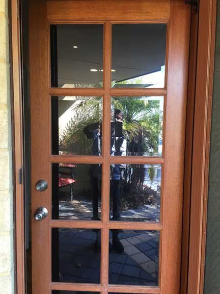 front door with tinted windows