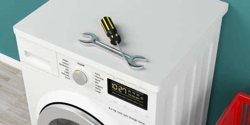 Washing Machine with Repairing Tools — San Antonio, TX — Jesse & Sons Appliance Repair Solutions
