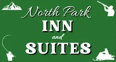 North Park Inn and Suites sign on green, with mountain, skier, hunter, and fisherman silhouettes.