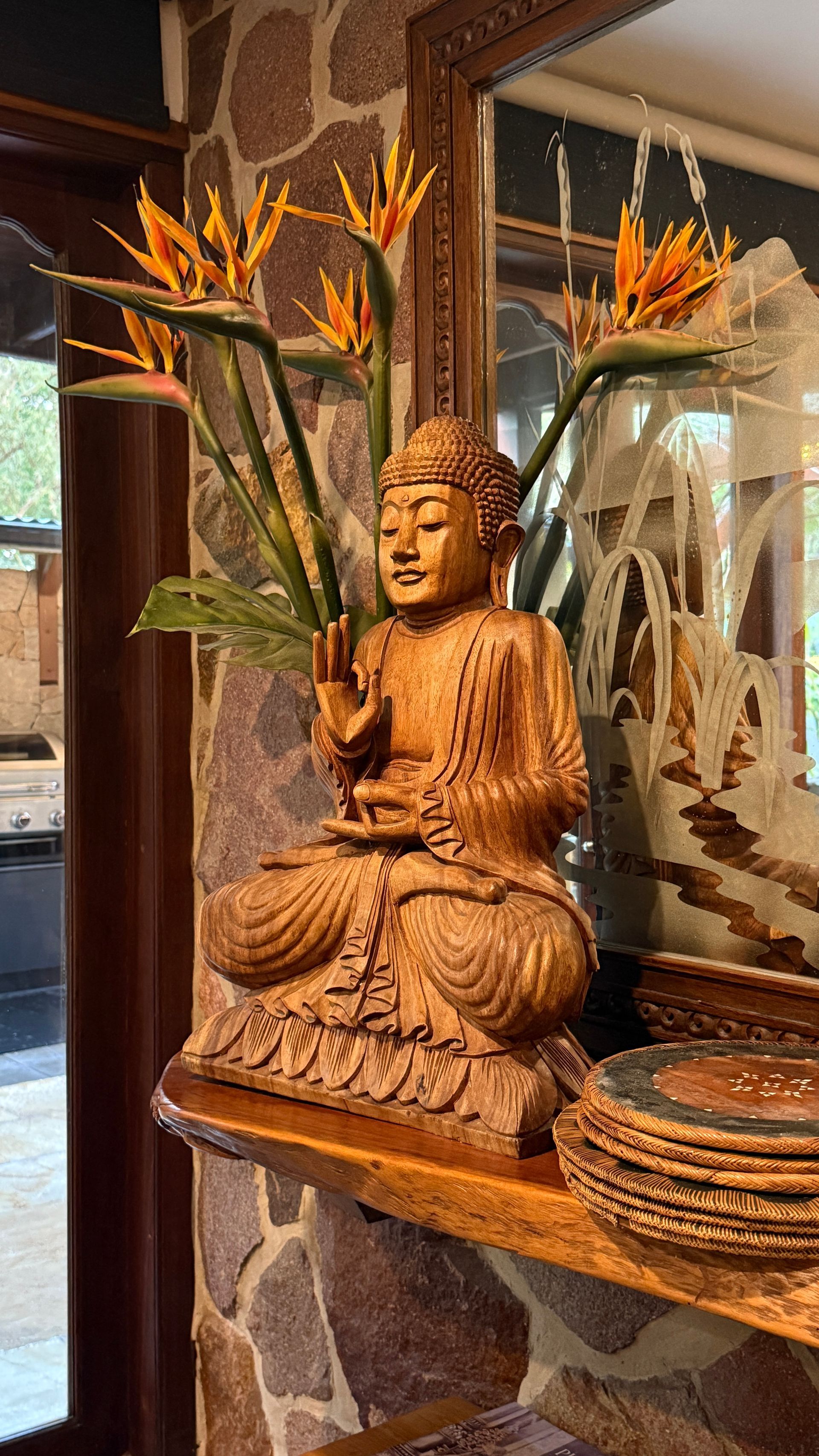 Wooden Buddha statue set on a shelf — Bali at the Bay in Nelson Bay, NSW
