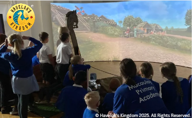 Havelok children watching journey on big screen from longship
