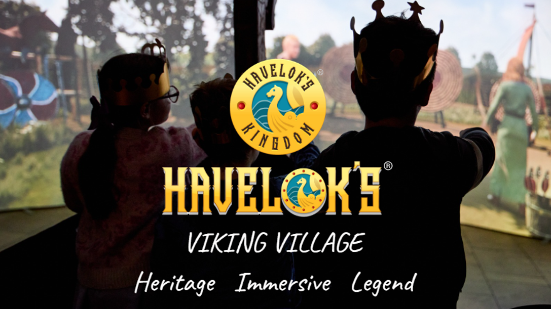 Havelok's Immersive Viking Village three children on longship entering the village wearing crowns
