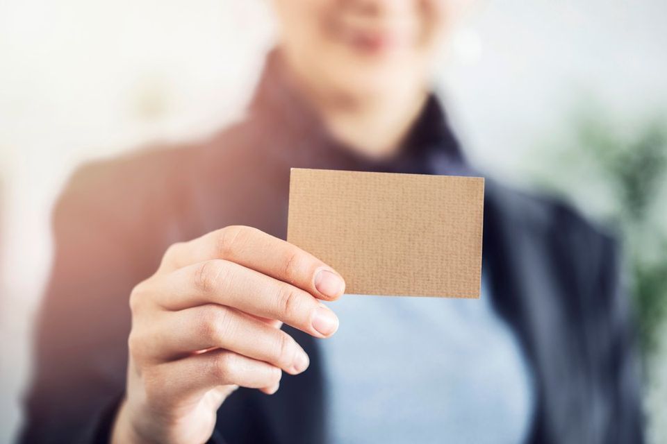 Business Woman Looking At Business Card — Pasadena, TX — InkSpot Printing 