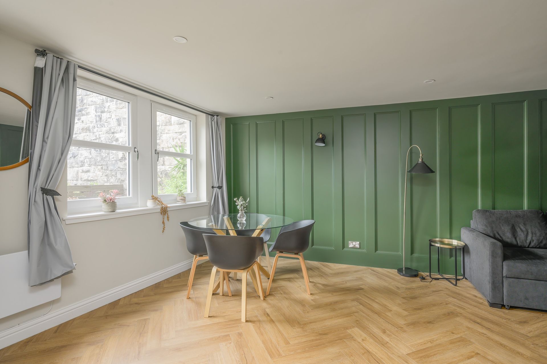 An aerial view of a city with a lot of buildings and trees. Book a One Bed Apartment at Grassmarket at BonnieHotel.com, Edinburgh; click here and book family apartments directly for the best accommodation deals in Central Edinburgh.