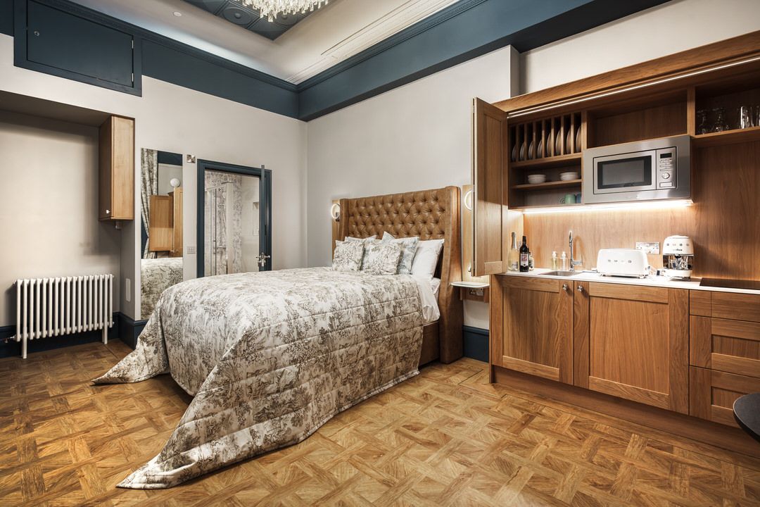 Book the spacious deluxe double bed suite at The Bonnie Hotel near Haymarket Station in Edinburgh's West End