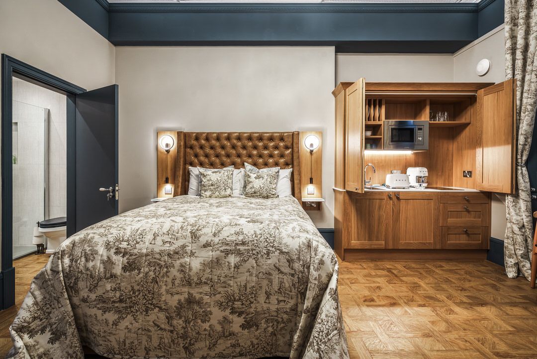 Book the deluxe double-bed suite at The Bonnie Hotel near Haymarket Station in Edinburgh's West End